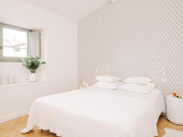 La Demeure de la Cité by Jean Bacou : photo 1 de la chambre chambre double deluxe