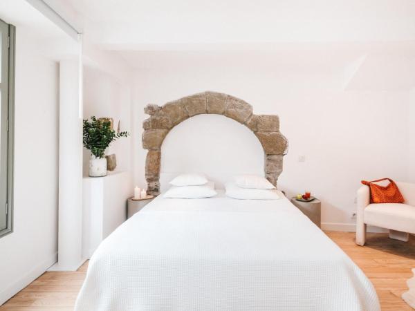 La Demeure de la Cité by Jean Bacou : photo 1 de la chambre chambre double supérieure