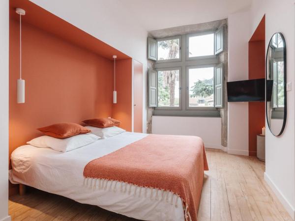 La Demeure de la Cité by Jean Bacou : photo 2 de la chambre chambre double avec salle de bains privative