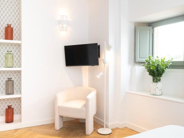 La Demeure de la Cité by Jean Bacou : photo 8 de la chambre chambre double deluxe