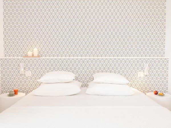 La Demeure de la Cité by Jean Bacou : photo 9 de la chambre chambre double deluxe