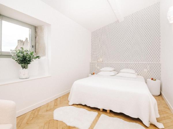 La Demeure de la Cité by Jean Bacou : photo 10 de la chambre chambre double deluxe