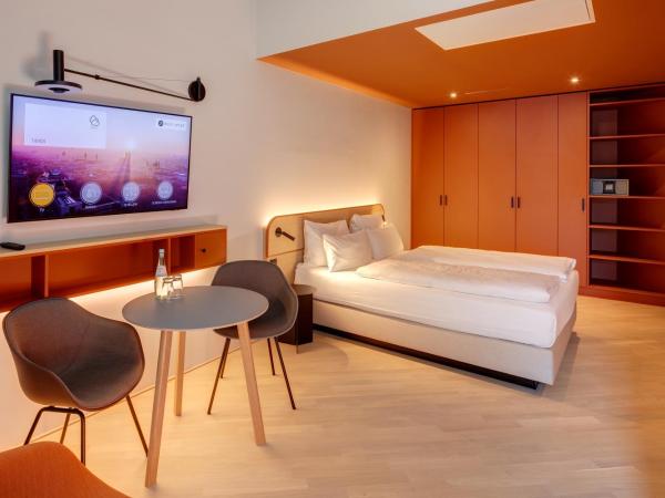 DEIN APART München : photo 4 de la chambre chambre double - accessible aux personnes à mobilité réduite 