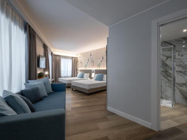 IH Hotels Milano Centrale : photo 2 de la chambre chambre supérieure avec 2 lits queen-size