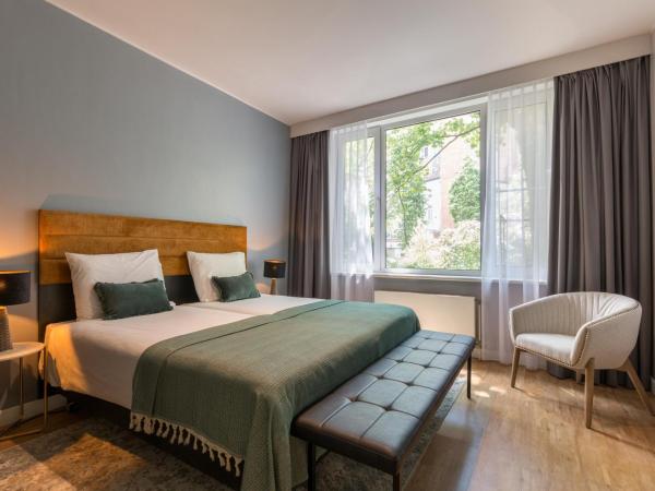 Leonardo Hotel Antwerp The Plaza : photo 2 de la chambre appartement 4 chambres