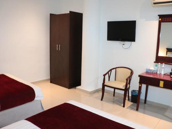 AL Amin Family Friendly Hotel : photo 8 de la chambre chambre triple Économique