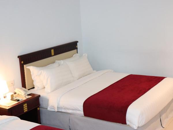 AL Amin Family Friendly Hotel : photo 4 de la chambre chambre familiale avec salle de bains privative
