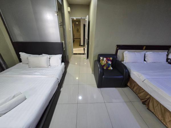 AL Amin Family Friendly Hotel : photo 1 de la chambre chambre deluxe avec 2 lits queen-size