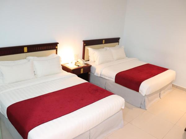 AL Amin Family Friendly Hotel : photo 5 de la chambre chambre familiale avec salle de bains privative