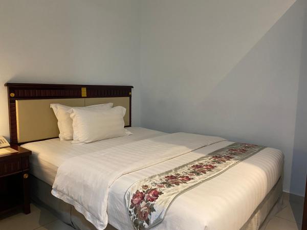 AL Amin Family Friendly Hotel : photo 1 de la chambre chambre simple avec salle de bains privative