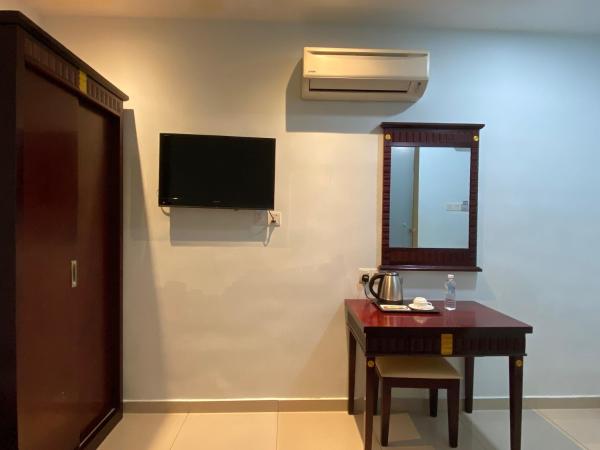 AL Amin Family Friendly Hotel : photo 2 de la chambre chambre simple avec salle de bains privative