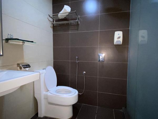 AL Amin Family Friendly Hotel : photo 3 de la chambre chambre simple avec salle de bains privative