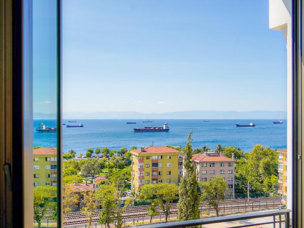 The Grand Mira Business Hotel : photo 5 de la chambre chambre double deluxe avec balcon - vue sur mer