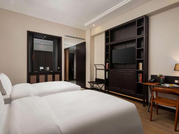 Doubletree By Hilton Shanghai Hongqiao : photo 1 de la chambre chambre lits jumeaux deluxe avec vue sur le jardin