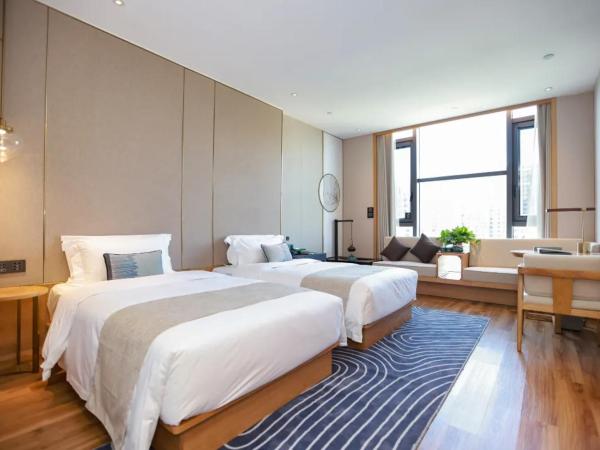 臻程酒店北京西铁营地铁站店 : photo 1 de la chambre chambre lits jumeaux