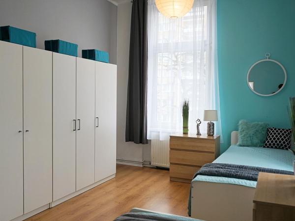 Beautiful rooms in the center : photo 2 de la chambre chambre triple