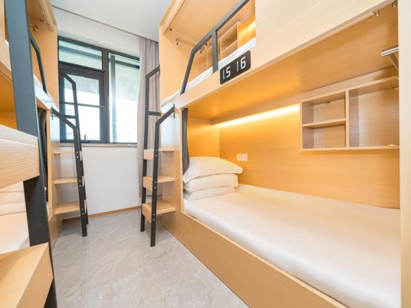 Denpa Inn - Shanghai Hongqiao Jinhui Road Branch : photo 3 de la chambre bed in 8-bed male dormitory room - shared bathroom