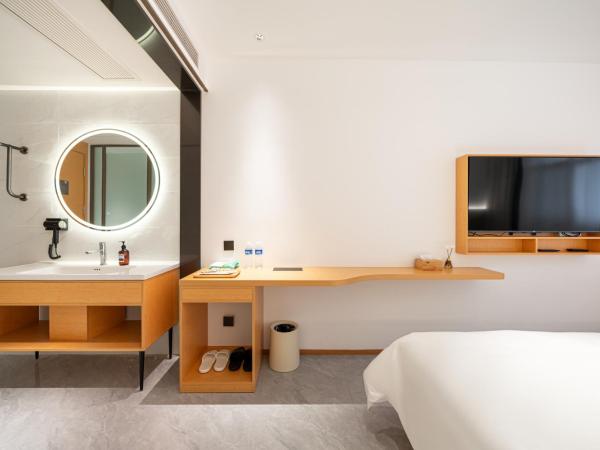 Denpa Inn - Shanghai Hongqiao Jinhui Road Branch : photo 4 de la chambre chambre lits jumeaux deluxe