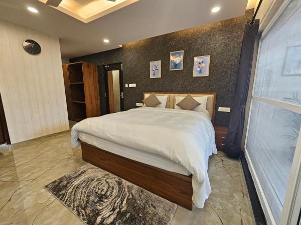 The Urban Nest : photo 5 de la chambre suite lit king-size avec balcon