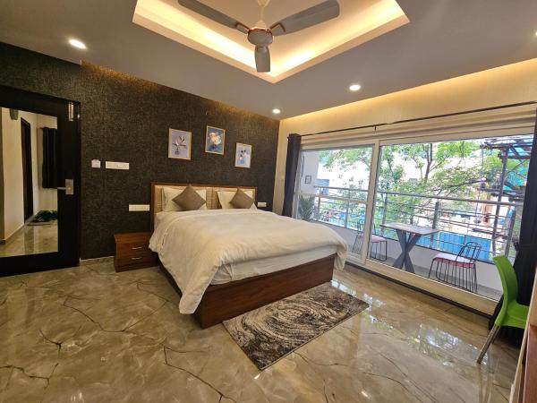 The Urban Nest : photo 1 de la chambre suite lit king-size avec balcon