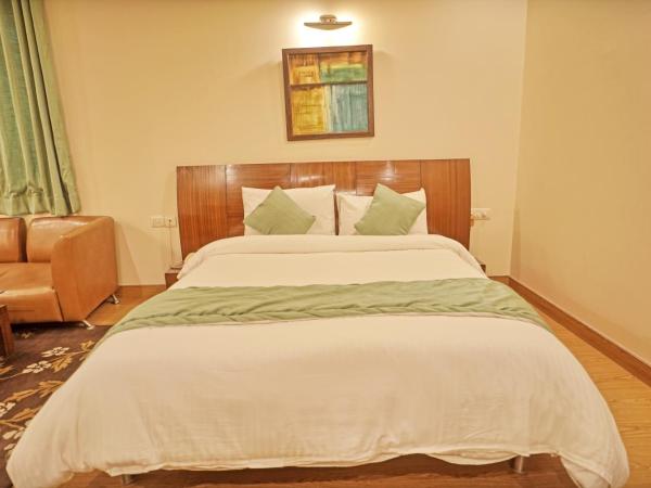 Enkay Suites : photo 9 de la chambre chambre deluxe