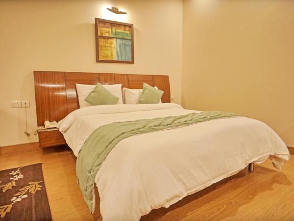 Enkay Suites : photo 10 de la chambre chambre deluxe