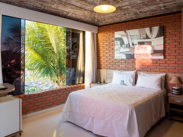 Costa do Sol Boutique Hotel : photo 1 de la chambre standard suite with garden view