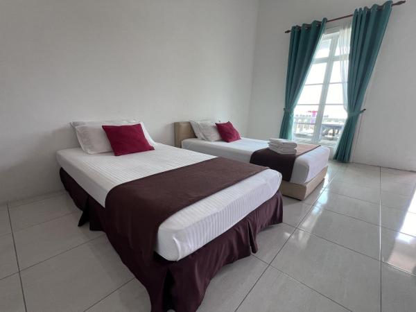 Saujana Villa Cherok Paloh : photo 1 de la chambre chambre lits jumeaux deluxe