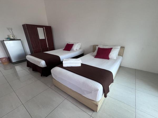 Saujana Villa Cherok Paloh : photo 4 de la chambre chambre lits jumeaux deluxe