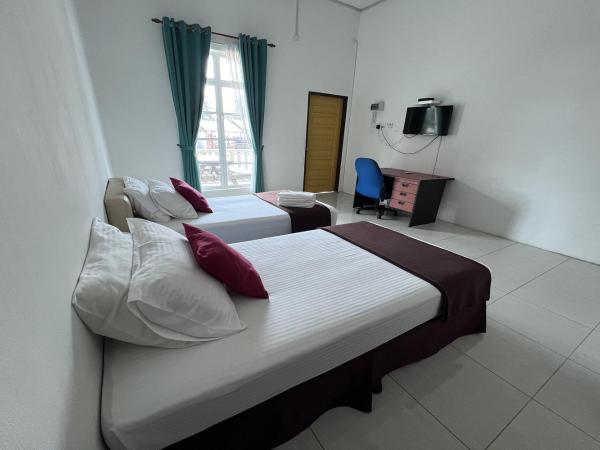 Saujana Villa Cherok Paloh : photo 2 de la chambre chambre lits jumeaux deluxe