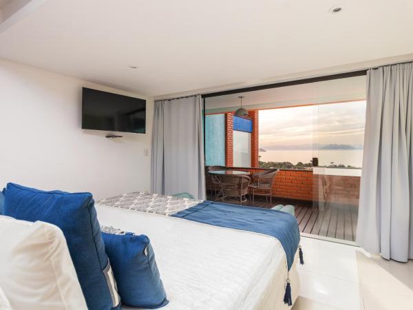 Costa do Sol Boutique Hotel : photo 3 de la chambre suite deluxe - vue sur mer