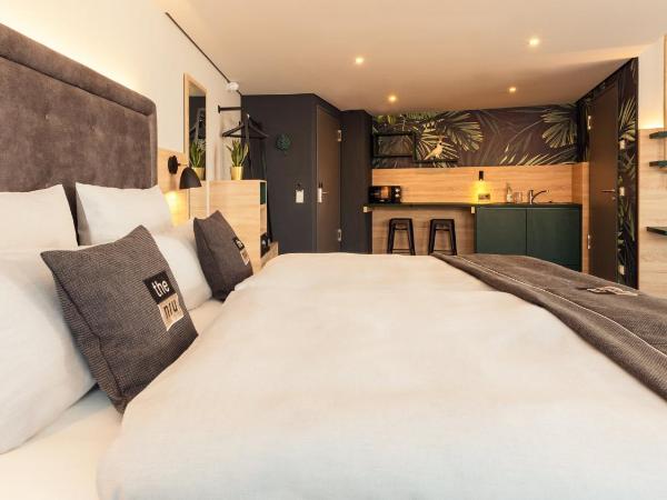 Holiday Inn - the niu, Crusoe Bremen Airport, an IHG Hotel : photo 1 de la chambre chambre premium lit queen-size avec canapé-lit