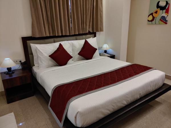 COASTAL GRAND Cassa Times - Electronic City : photo 1 de la chambre chambre double standard