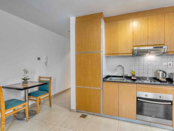 Grand Heights Hotel Apartments : photo 2 de la chambre studio classique