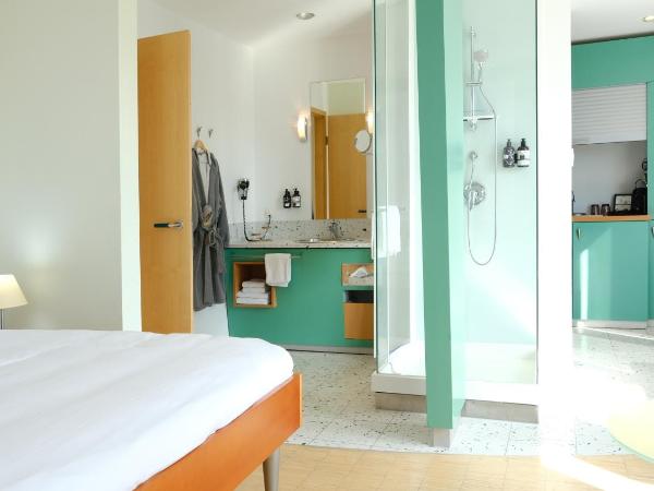 FOUR Munich Neue Messe : photo 3 de la chambre premium queen room with kitchenette