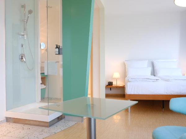 FOUR Munich Neue Messe : photo 4 de la chambre premium queen room with kitchenette