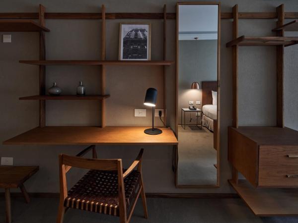 AQ Tailored Suites : photo 6 de la chambre suite deluxe avec lit king-size