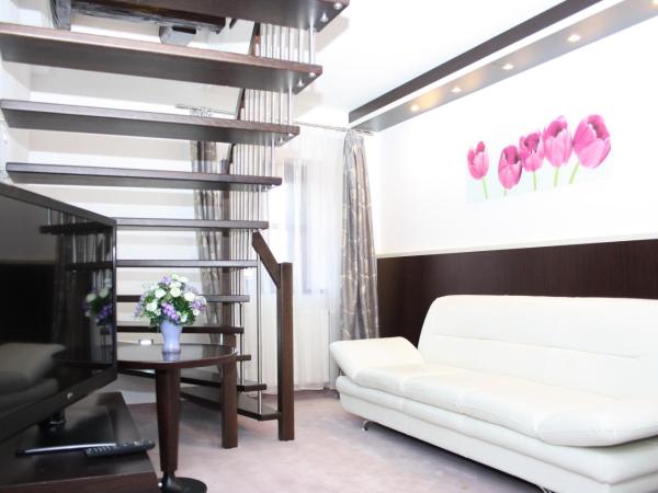 Hotel Grand : photo 9 de la chambre suite en duplex - vue sur château