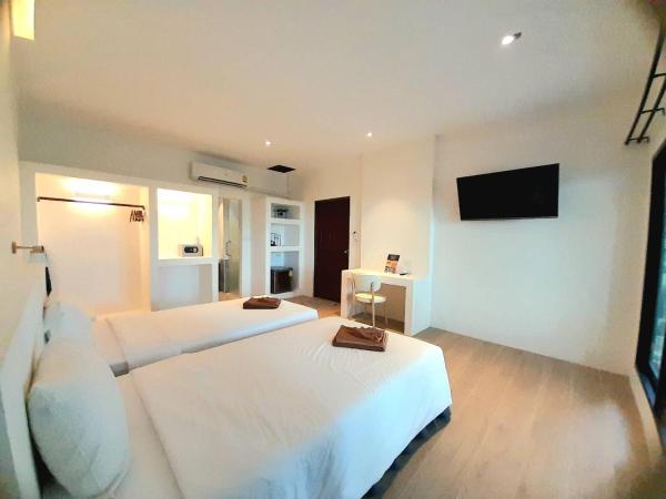 Twin Bay Resort Koh Lanta : photo 5 de la chambre chambre double ou lits jumeaux supérieure - vue sur jardin