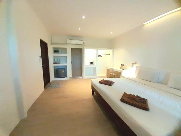 Twin Bay Resort Koh Lanta : photo 2 de la chambre chambre double ou lits jumeaux supérieure - vue sur jardin