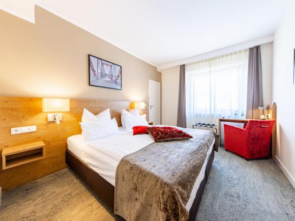 Maingau Hotel : photo 1 de la chambre chambre double standard