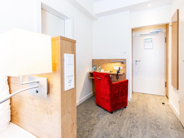 Maingau Hotel : photo 4 de la chambre chambre lits jumeaux