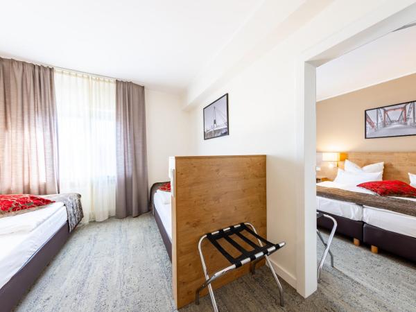 Maingau Hotel : photo 5 de la chambre chambre lits jumeaux