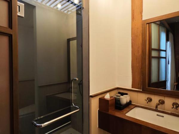 Chann Bangkok Noi : photo 4 de la chambre chambre deluxe - vue sur jardin