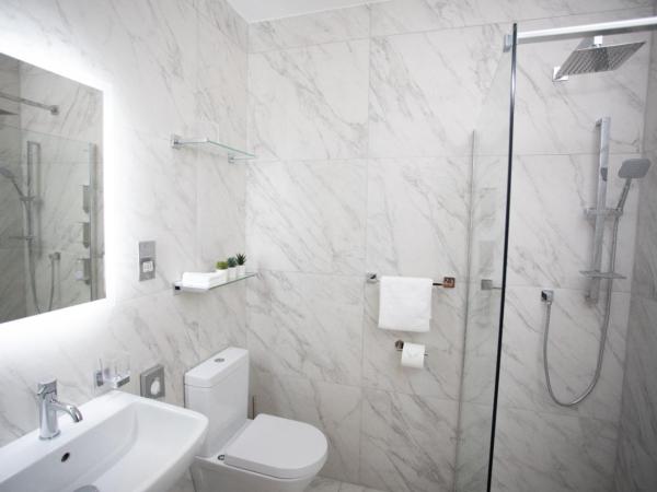 The Cássidys Inn : photo 6 de la chambre suite supérieure lit king-size