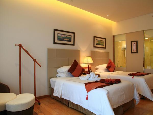 Mingshen Golf & Bay Resort Sanya : photo 5 de la chambre chambre lits jumeaux deluxe avec vue sur le jardin