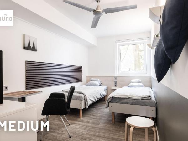 NunoHotel : photo 2 de la chambre chambre lits jumeaux confort moyenne