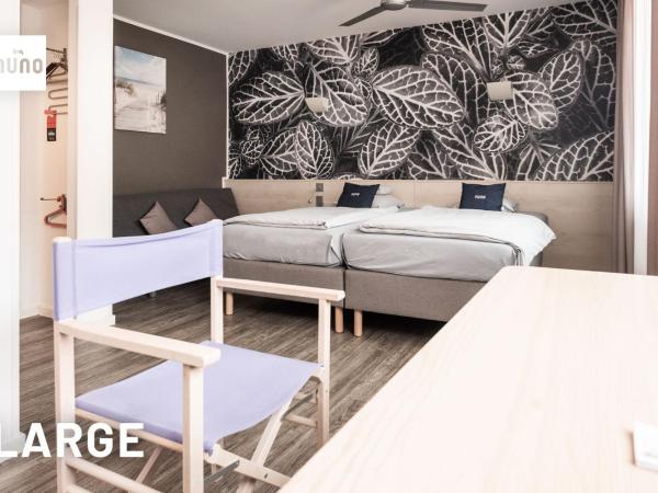 NunoHotel : photo 4 de la chambre grande chambre confort 1 lit queen-size et 1 lit simple 