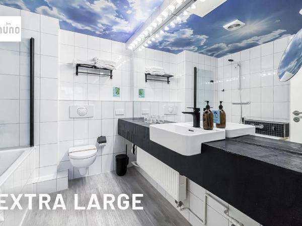 NunoHotel : photo 6 de la chambre chambre double confort avec 2 lits doubles