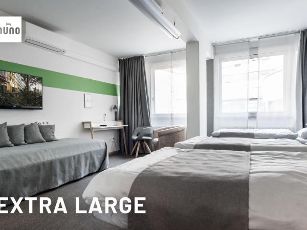 NunoHotel : photo 2 de la chambre chambre double confort avec 2 lits doubles